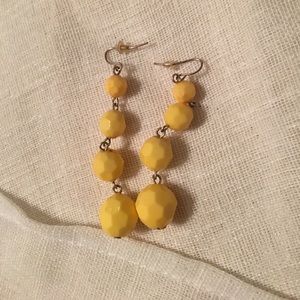 Yellow dangly earrings